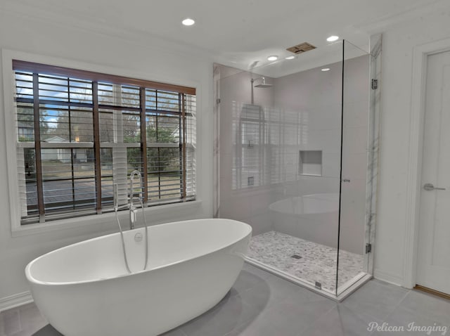 bathroom with tile patterned flooring and plus walk in shower