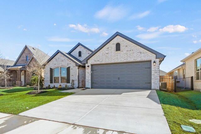 back of property with a yard and a patio