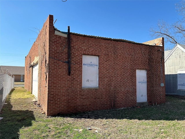 view of property exterior with a yard