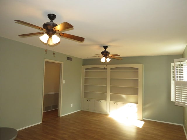 unfurnished room featuring dark hardwood / wood-style floors