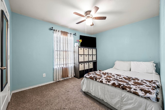 bedroom with ceiling fan and carpet