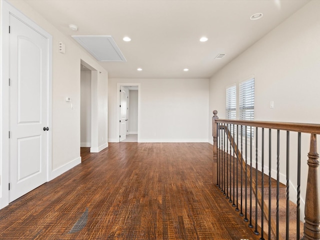 unfurnished room featuring baseboards and recessed lighting