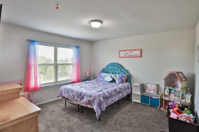 carpeted bedroom with a textured ceiling