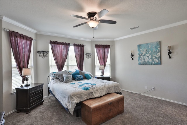 bedroom featuring dark colored carpet, ornamental molding, and a textured ceiling