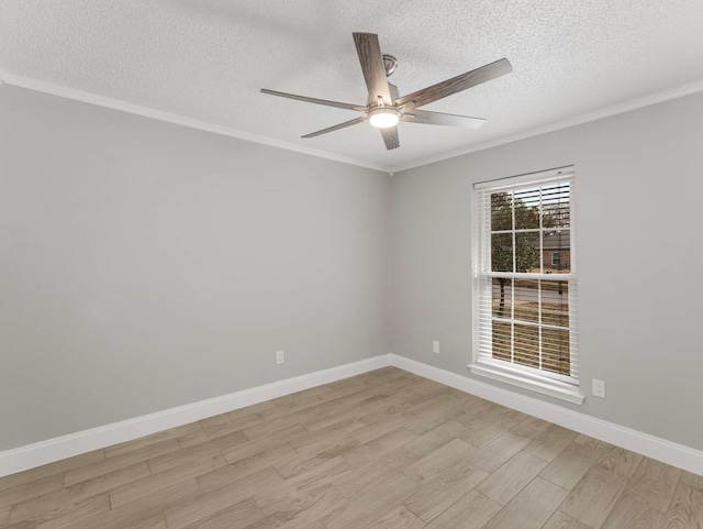 unfurnished room with ceiling fan, ornamental molding, and light hardwood / wood-style floors