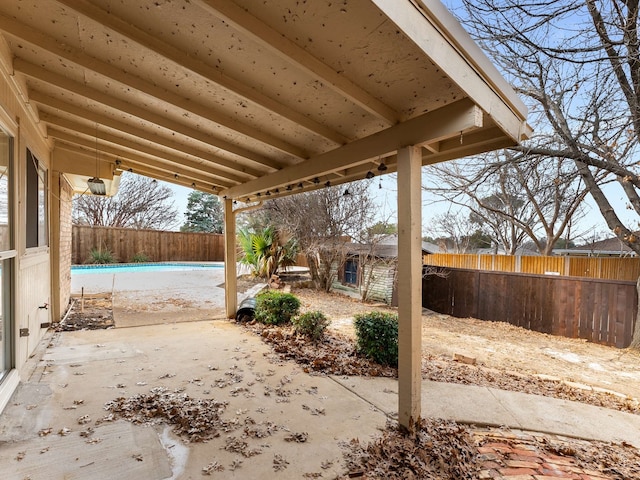 view of patio featuring an outdoor structure