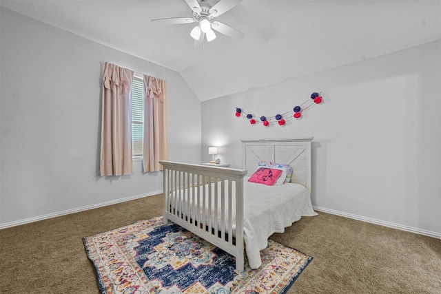 bedroom with lofted ceiling, ceiling fan, baseboards, and carpet flooring