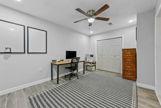 office area featuring ceiling fan, recessed lighting, visible vents, baseboards, and wood tiled floor