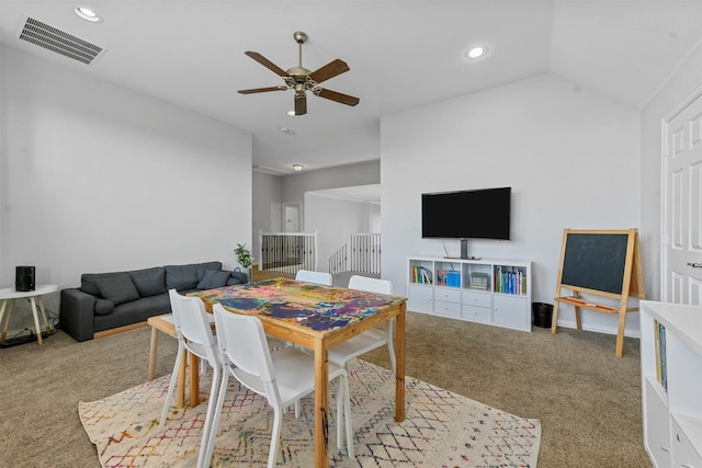 carpeted dining area with a ceiling fan, recessed lighting, visible vents, and vaulted ceiling