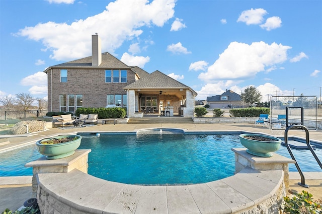 view of pool featuring a patio area, fence, a ceiling fan, and a fenced in pool