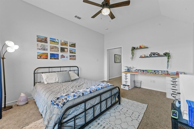 bedroom with lofted ceiling, carpet floors, visible vents, and a ceiling fan