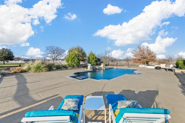 view of pool with a patio area, fence, and a fenced in pool