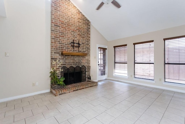 unfurnished living room featuring ceiling fan, high vaulted ceiling, a brick fireplace, and light tile patterned floors