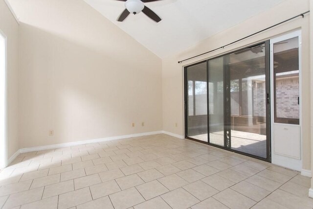 dining area with ceiling fan, lofted ceiling, and light tile patterned floors