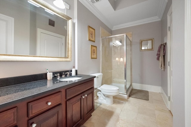 bathroom with vanity, crown molding, a shower with shower door, and toilet