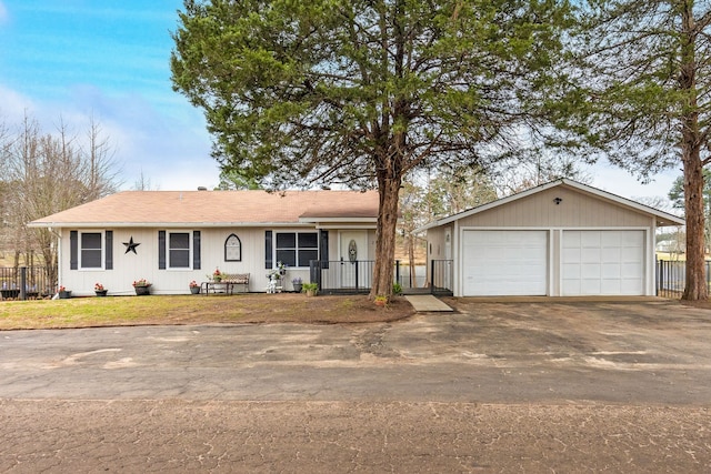 single story home featuring a garage