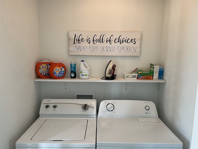 washroom with washer and clothes dryer