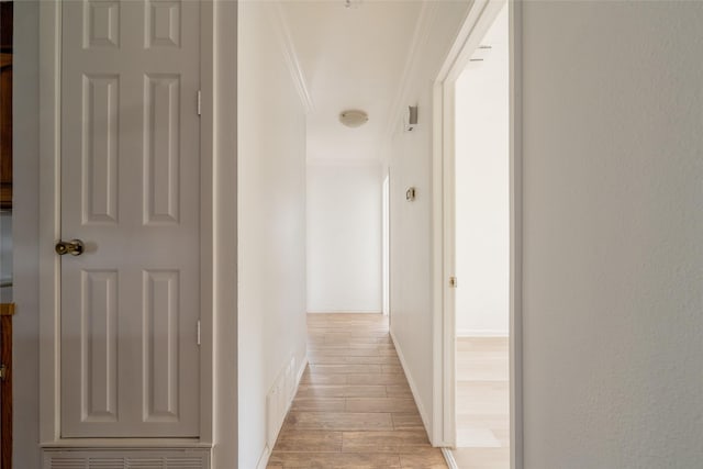 hallway with crown molding