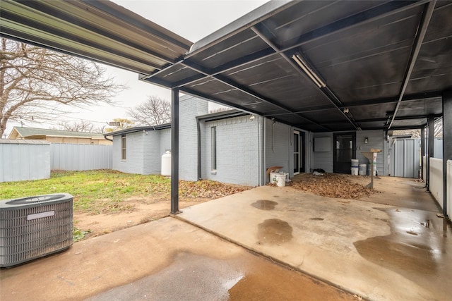 exterior space featuring central AC unit