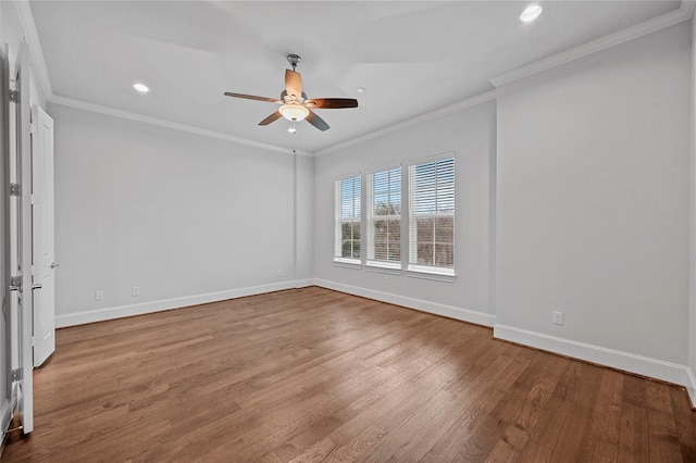 empty room with ornamental molding, ceiling fan, and light hardwood / wood-style flooring