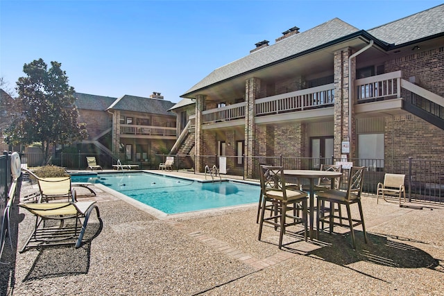 view of pool with a patio