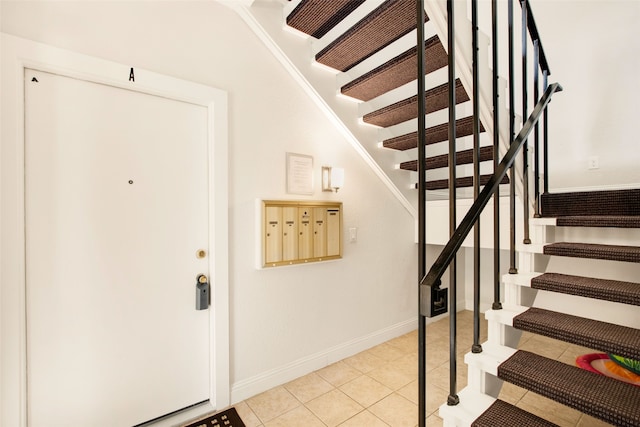 tiled entryway with mail boxes