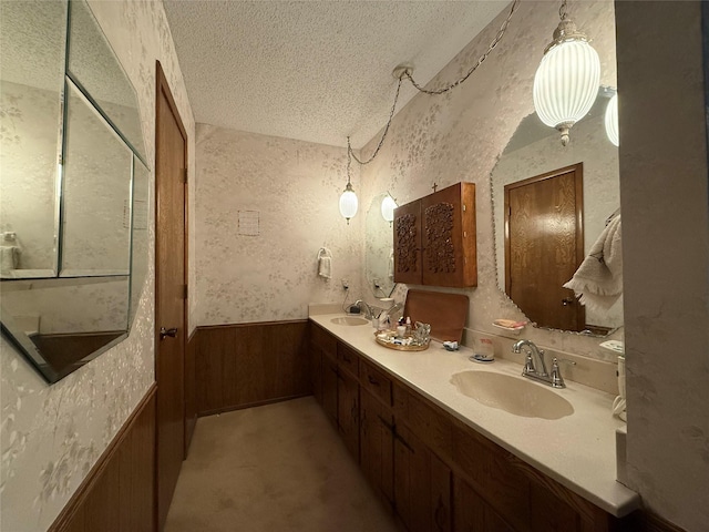 bathroom featuring vanity and a textured ceiling