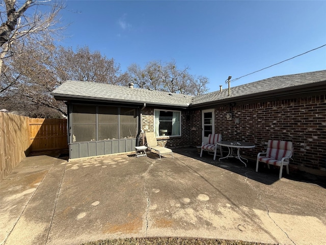 back of property featuring a patio