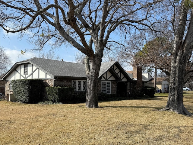 view of property exterior featuring a lawn