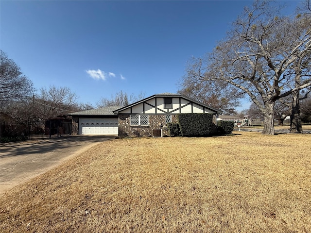 view of front facade with a garage, central AC, and a front yard