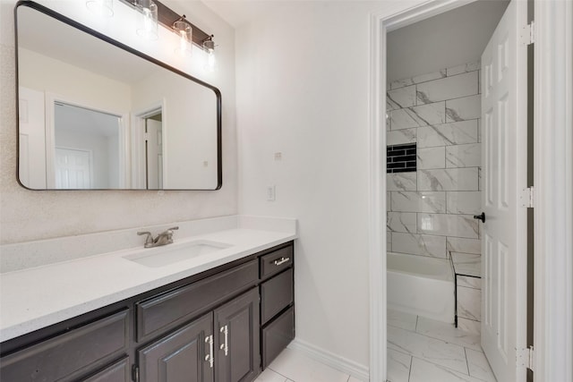 bathroom featuring vanity and tiled shower / bath combo