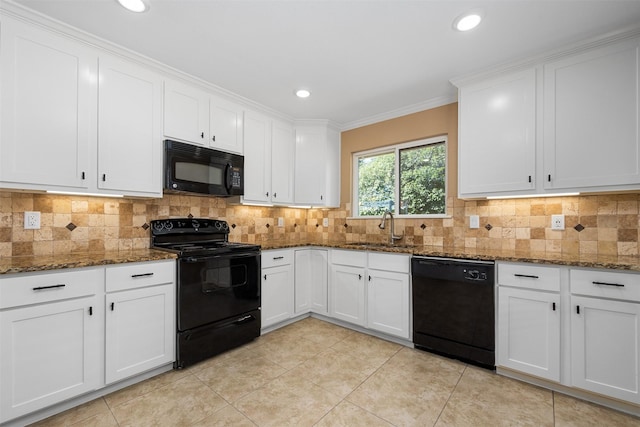 kitchen with white cabinetry, sink, and black appliances