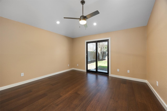 unfurnished room featuring ceiling fan and dark hardwood / wood-style floors