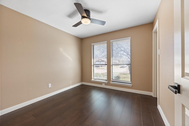 unfurnished room featuring dark hardwood / wood-style floors and ceiling fan