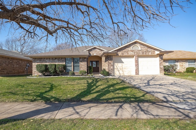 ranch-style home with a garage and a front yard