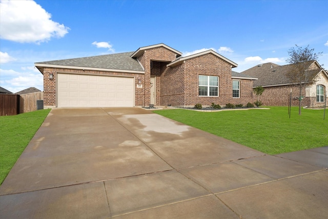 single story home with concrete driveway, brick siding, an attached garage, and a front lawn