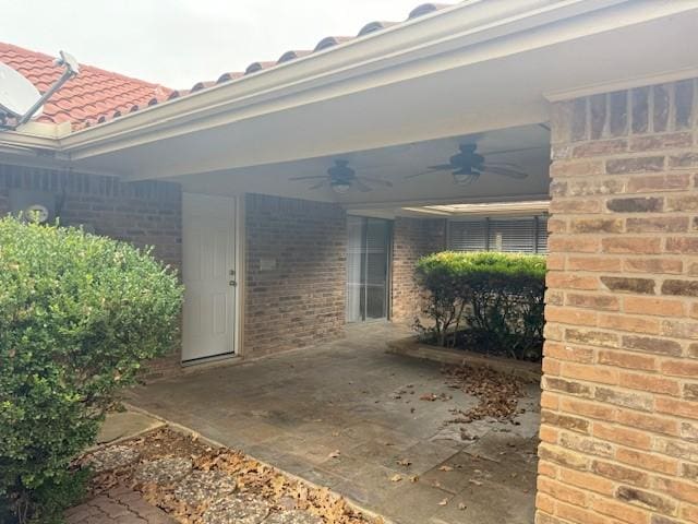 view of patio with ceiling fan