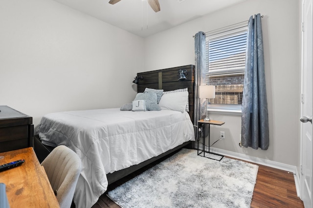 bedroom featuring dark wood-type flooring and ceiling fan