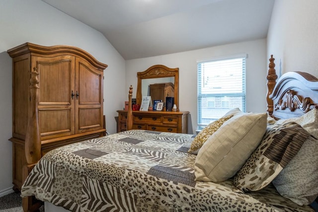 bedroom featuring vaulted ceiling