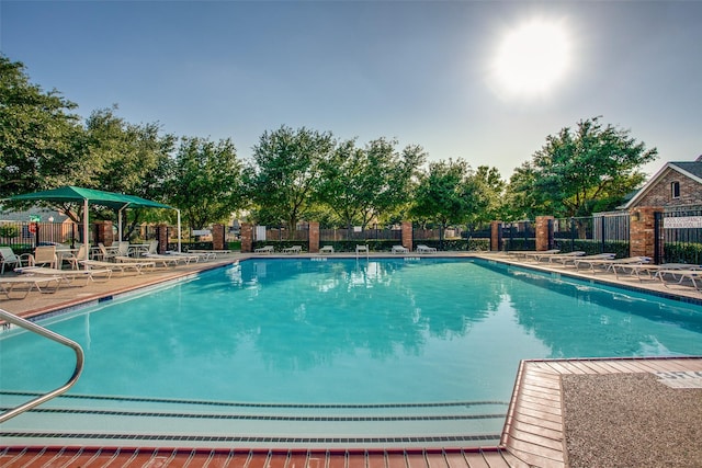 view of swimming pool featuring a patio