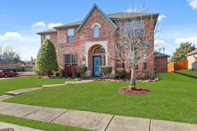 view of front of home with a front lawn