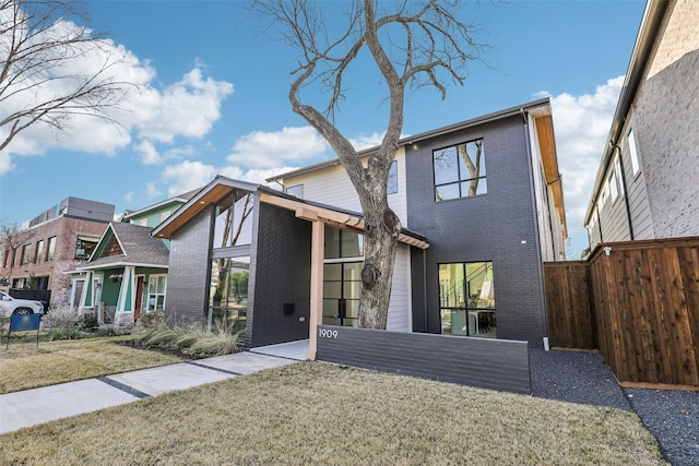 view of front of home with a front yard