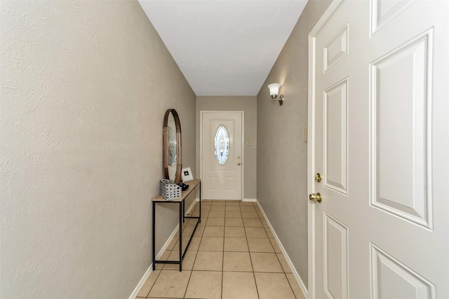 entryway featuring light tile patterned floors