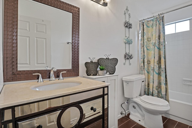 bathroom with toilet, shower / bath combination with curtain, and vanity