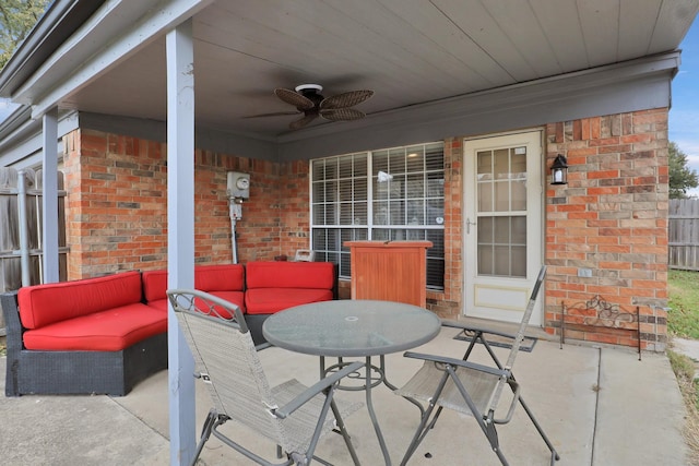 view of patio featuring an outdoor hangout area and ceiling fan