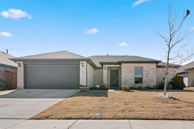 ranch-style house featuring a garage