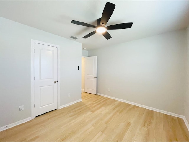 unfurnished bedroom with ceiling fan and light hardwood / wood-style floors