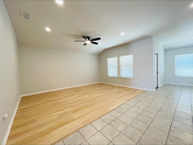 unfurnished room featuring ceiling fan and light wood-type flooring