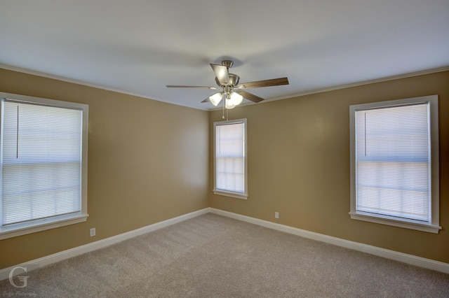 spare room featuring carpet flooring and ceiling fan