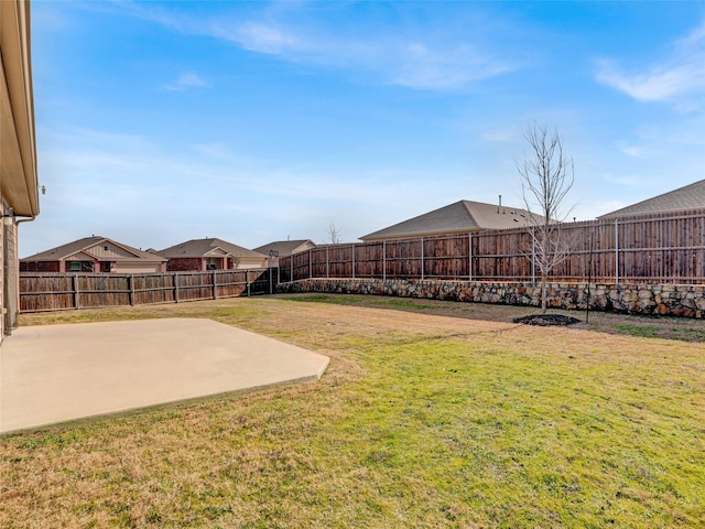 view of yard with a patio area